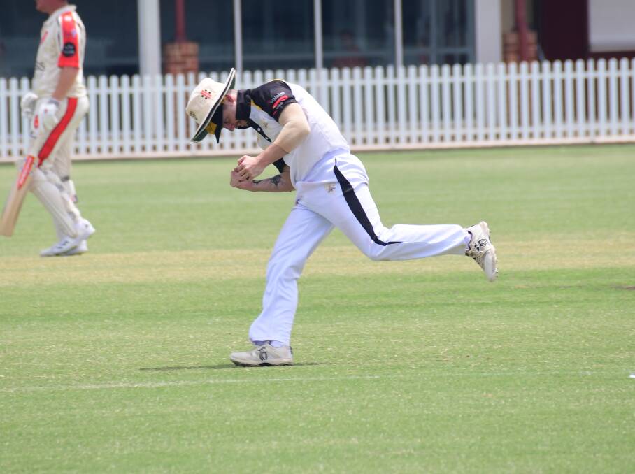 GOT HIM: Newtown captain Mitch Russo celebrates taking catch prior to Christmas. Picture: AMY MCINTYRE