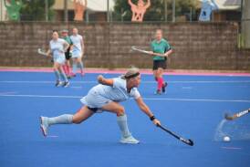 ON THE MOVE: Deb Robinson from Dubbo goes for a block in the successful Masters of the Bush hockey carnival over the weekend. Photo: CONTRIBUTED