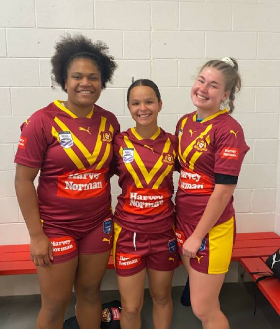 PROUD PLAYERS: Taneka Todhunter (centre) represented NSW Country last week at the National Championships. Photo: CONTRIBUTED