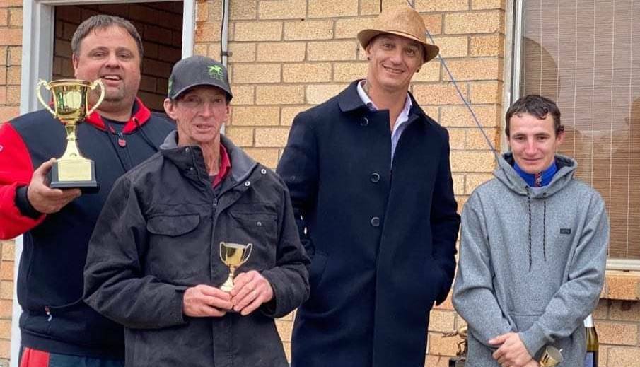 ANOTHER ONE: Dar Lunn (second from left) with owners Rob Pratten (left) and Guy Mitchell, and jockey Clayton Gallagher after Classy Rebel's win in Gulgong earlier this year. Photo: DAR LUNN RACING FACEBOOK