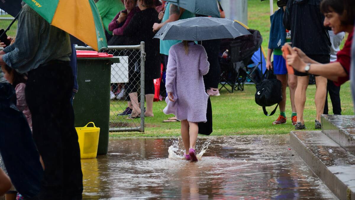 WET WEEKEND: Water flowing at the weekend's Little Athletics Region 3 State Qualifying Meet. Photo: AMY MCINTYRE