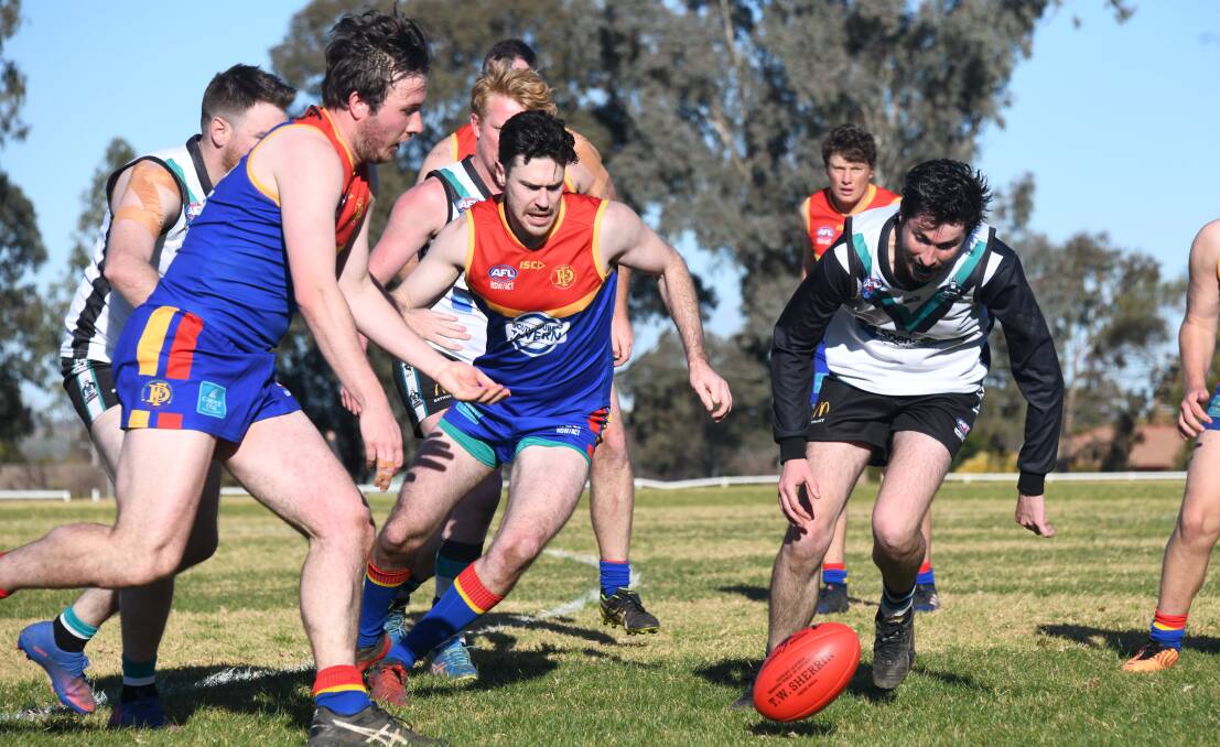 Dubbo Demons midfielder Bevan Charlton-White (middle) was strong in a losing side on Saturday. Picture: Amy McIntyre