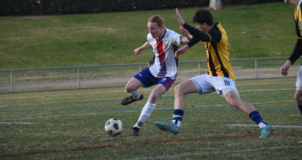 Spurs youngster Bailey McCabe found the back of the net against Macquarie United on Saturday night in his side's win. Picture by Amy McIntyre