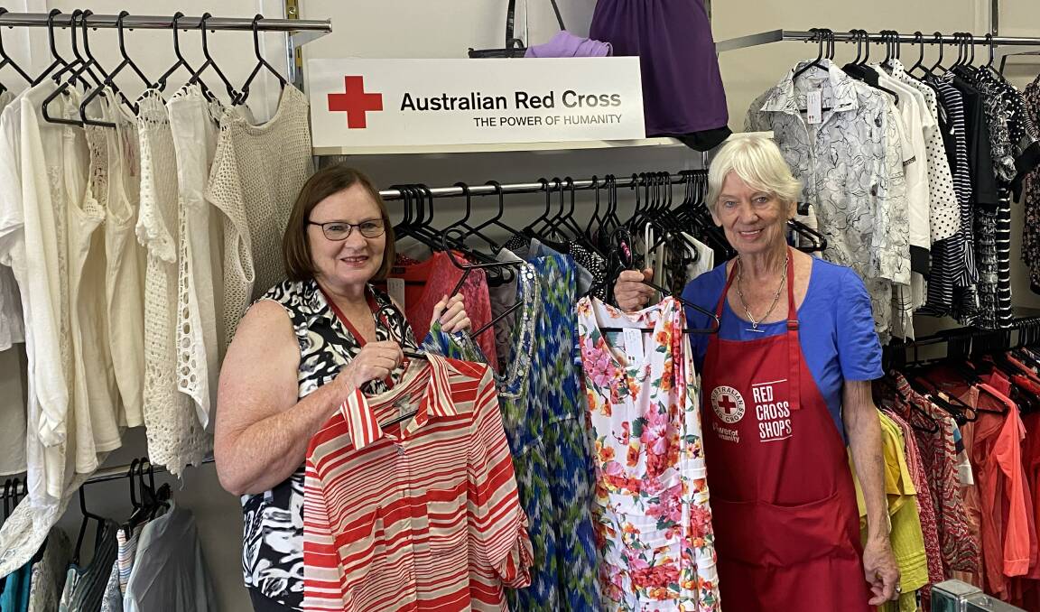 DONATION INCREASE: Australia Red Cross Dubbo store manager Julie Warren (left) and volunteer Ros Gable. Photo: TOM BARBER