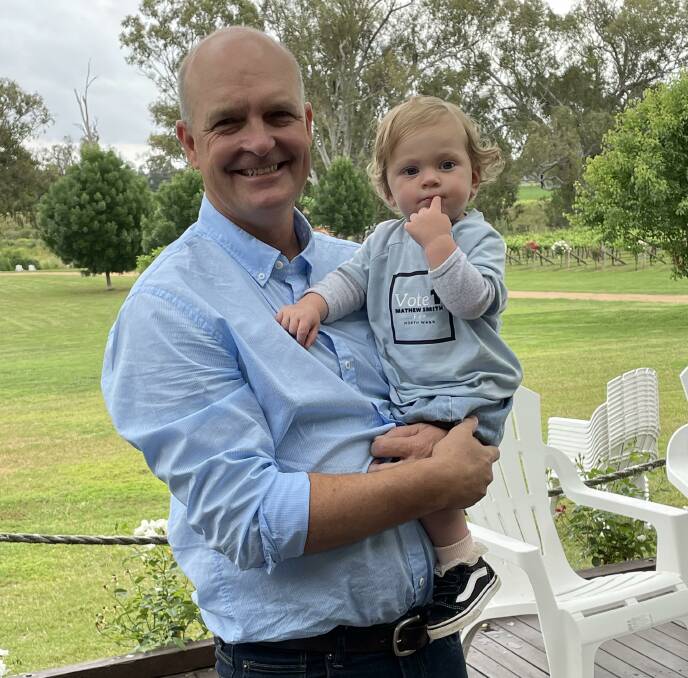 PASSIONATE: Council candidate and Lazy River Estate owner Matt Smith along with his granddaughter Harriet. Picture: TOM BARBER