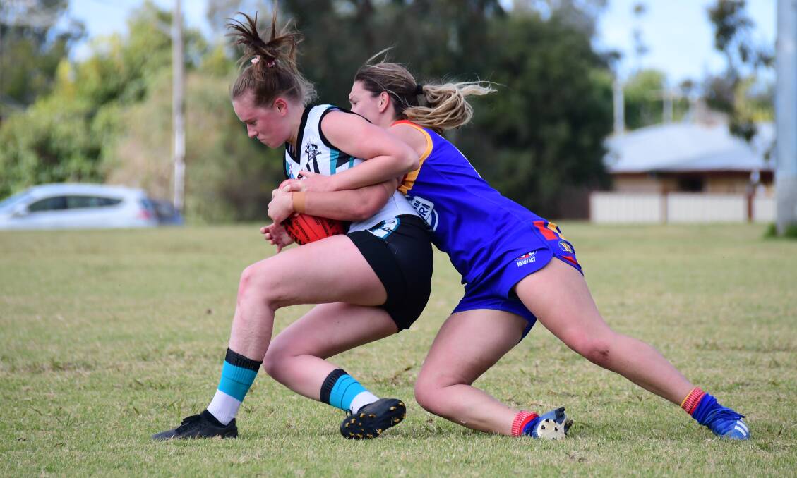 DOMINANT: Dubbo Demons' Em Warner makes a tackle against Bathurst earlier this year. Photo: AMY MCINTYRE