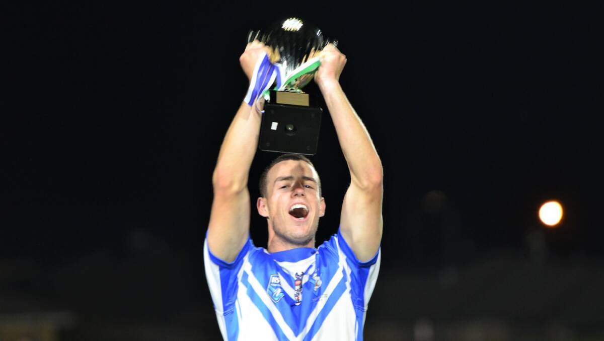 SUPER SKIPPER: St Pat's captain and halfback Cooper Neilsen, who was named joint player of the competition, hosts the Western under 21s premiership cup aloft. Photo: ANYA WHITELAW
