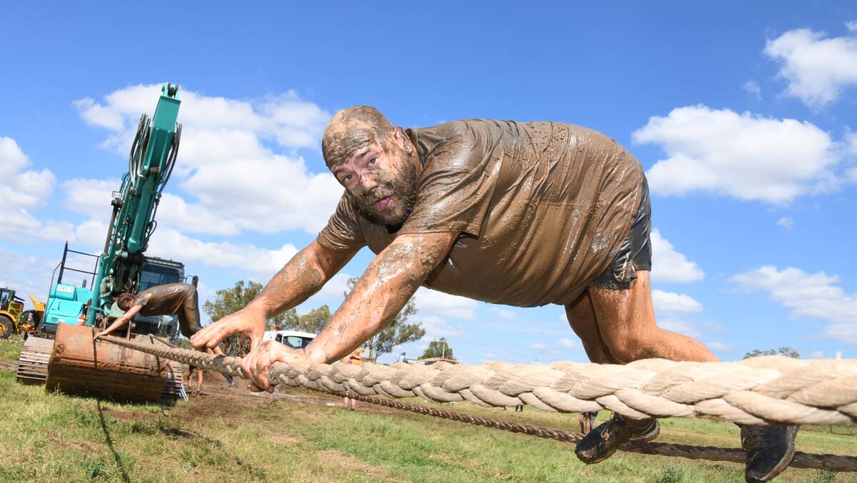 GALLERY: More than 1,000 people enjoy the mud. Pictures: AMY MCINTYRE