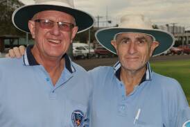 Phil Leonard (right), pictured with Geoff Mann, at No. 1 Oval during his time as an umpire in Dubbo cricket. Picture supplied