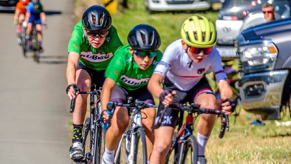 Dubbo Cycle Club members Cooper Farr and Sid Pickering chase down Jett Stokes. Picture by Velocity Fotography 