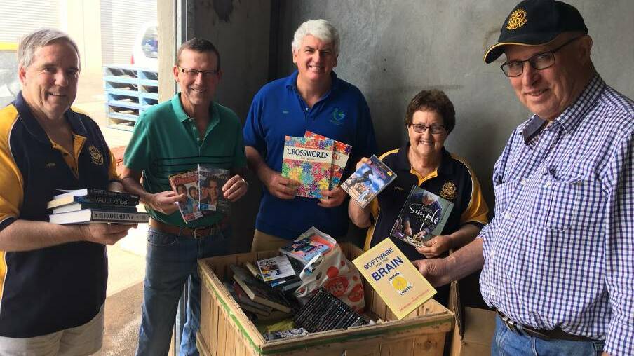 READY FOR DONATIONS: Rotary Club of Dubbo Macquarie's Peter Bartley, Garry Brown, Peter English, Lorna Breeze and Lawrie Donoghue are ready for this year's book fair donations to begin. PHOTO: Contributed.