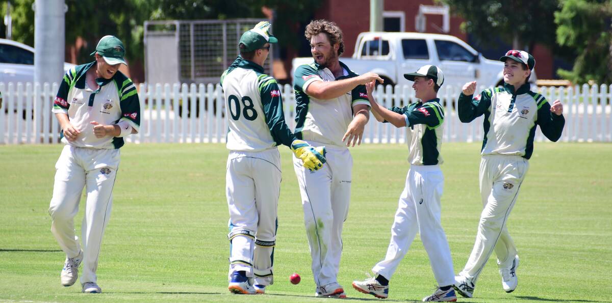 KEY INCLUSIONS: CYMS Cougars captain Ben Knaggs celebrates a wicket with his teammates last season. Photo: AMY MCINTYRE