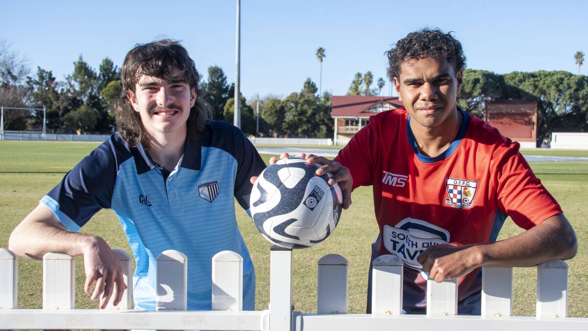 Macquarie United's Blake Smith and Orana Spurs winger Brad Boney-Chillie will do battle on Friday night. Picture by Belinda Soole