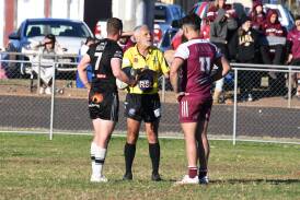 Referee Willy Barnes speaks with Forbes' Nick Greenhalgh (left) and Justin Toomey-White from Wellington (right). Picture by Nick Guthrie 