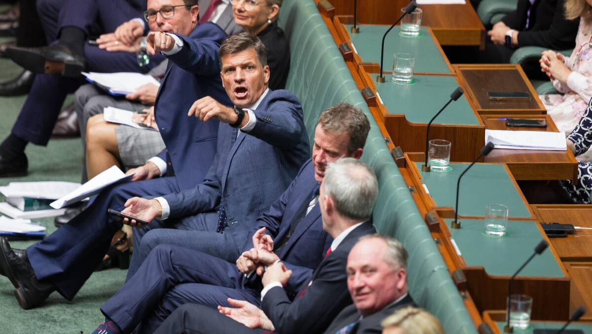 Angus Taylor gesturing to the public gallery. Picture by Sitthixay Ditthavong