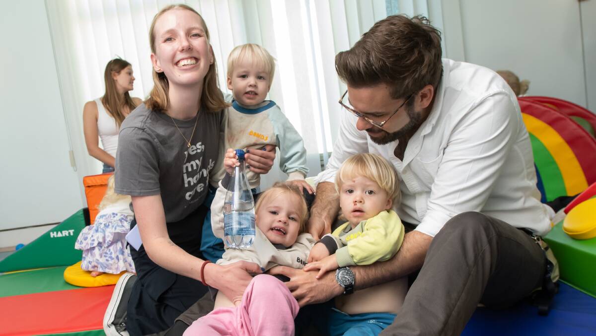 Silje Andersen-Cooke and Jordan Newnham with their triplets Ada, Erik and Theodore, 2, of Curtin. Picture by Elesa Kurtz