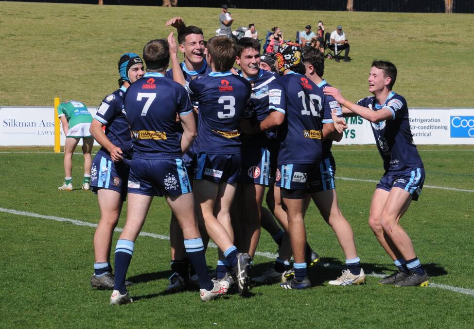 Orange Hawks players celebrate a try in the preliminary final against Dubbo CYMS. Picture by Tom Barber