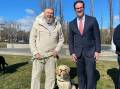 Terry Greaves and dog Nelson with veterans affairs minister Matt Keogh. Picture: Department of Veterans Affairs