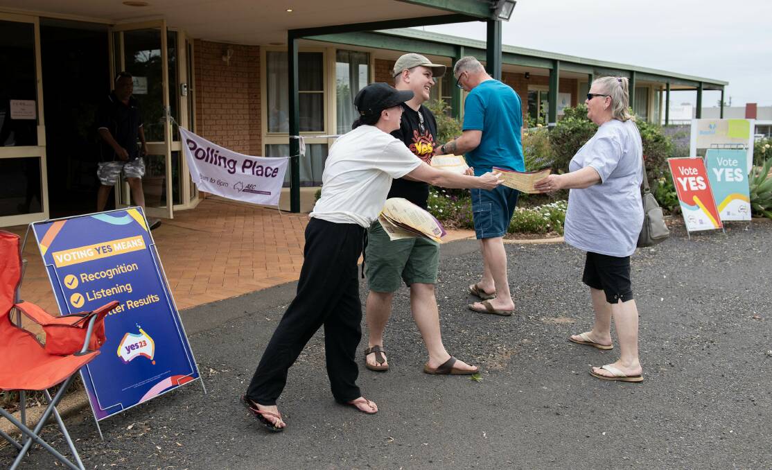 'Yes' campaigners hand out flyers at the pre-poll voting site in Dubbo. There were no 'No' campaigners on site. Picture by Belinda Soole