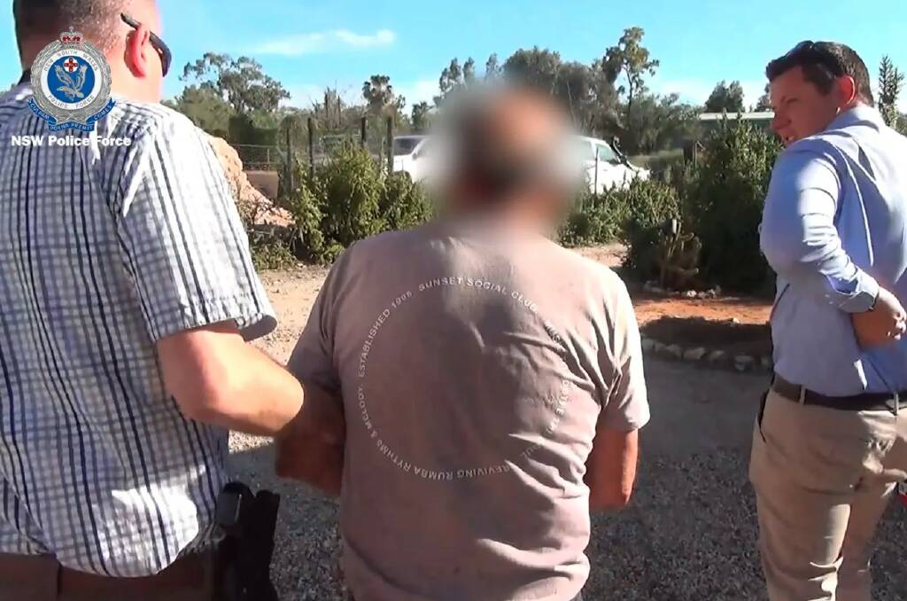 Vittorio Stefanato is arrested at the site of Amigo's Castle in October. Picture via NSW Police