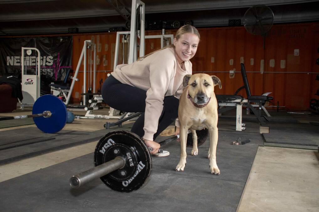 Nemesis Fitness client Emily Goedee with Sheeva, the gym's "owner". Picture by Belinda Soole