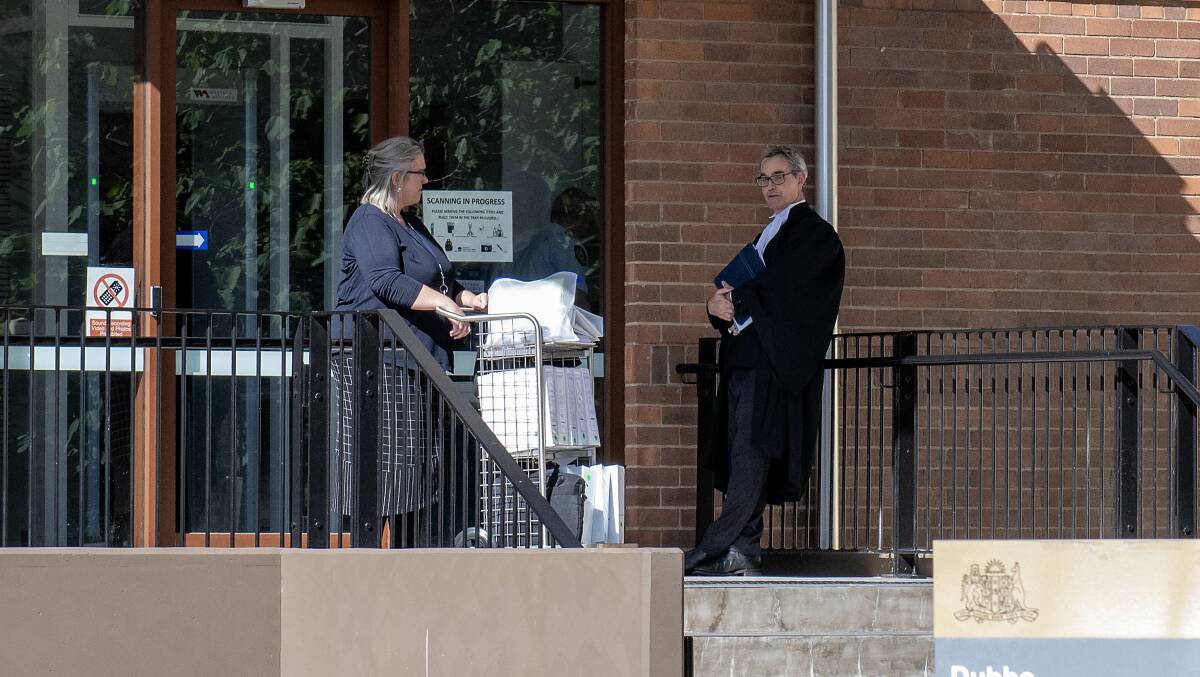 Crown prosecutor Liam Shaw (right) outside Dubbo Court as he prepared to finish his closing address. Picture by Belinda Soole 