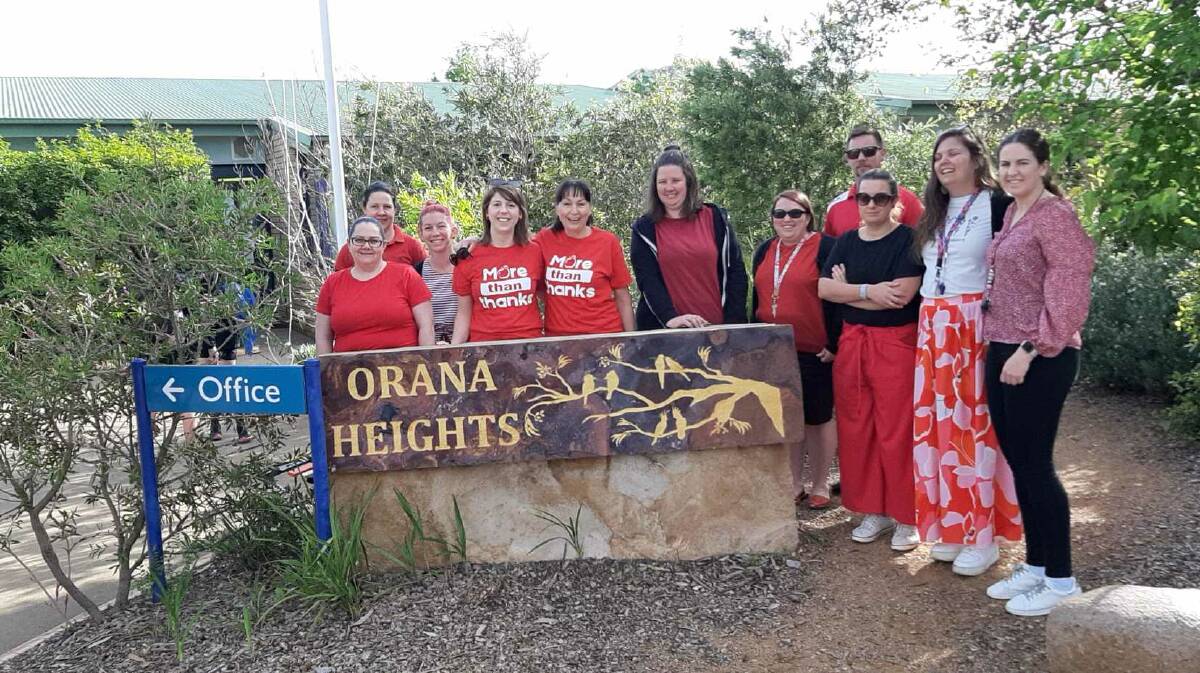 Staff at Orana Heights Public School in Dubbo wear red as part of the statewide day of action. Picture supplied