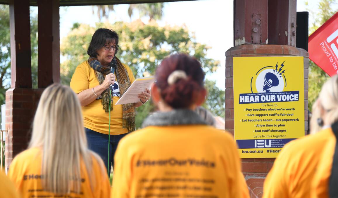 Louise Hughes addresses a crowd of protesters in May when local Catholic school teachers went on strike. Picture by Amy McIntyre