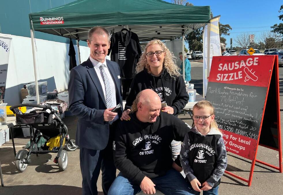 MULLET MATES: Tyson Meers cuts a local man's hair alongside Mayor Mathew Dickerson and Mulletfest founder Laura Johnson. Picture: Facebook/