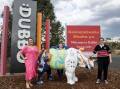 Artist Laura Dunkley, Dubbo mayor Matthew Dickerson and Madison Roche from Dubbo Senior Campus with the rhino Madison designed. Picture by Belinda Soole