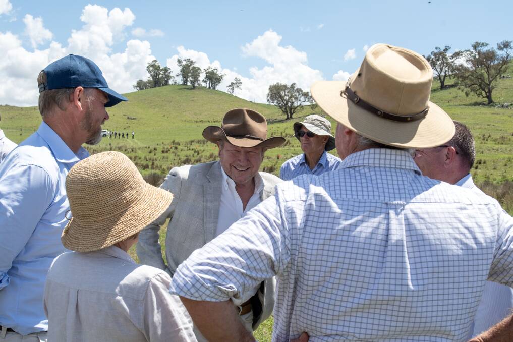 Energy magnate Andrew Forrest (centre) is promising better internet connectivity as one benefits for the community of the new Uungala Wind Farm. Picture by Belinda Soole