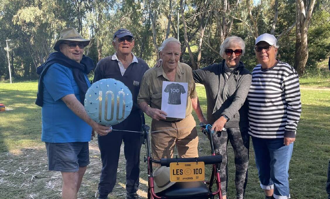 Les Brookfield (centre) celebrated his parkrun milestone with friends and family. Picture supplied