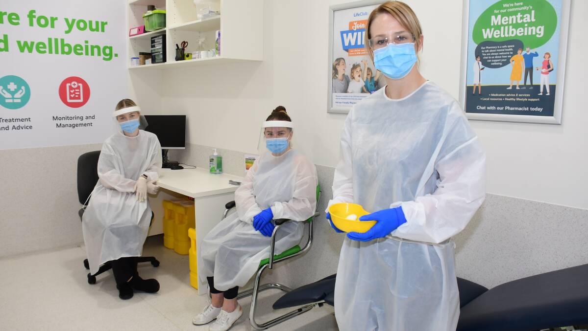 MODERNA ROLLOUT: Chloe Hawke, Mollie Gersbach and Lisa Gibson expect to receive doses of the Moderna COVID-19 vaccine at Orana Mall Pharmacy from next week. Photo: AMY MCINTYRE
