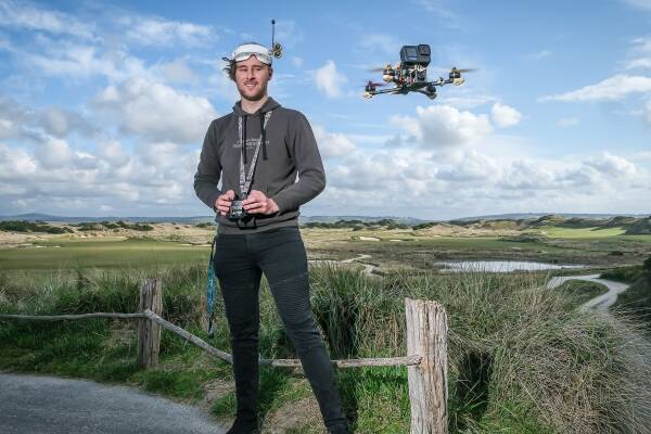 Jeffrey Darby-Norris, 20, with the drone he uses for his video and image business based in Scottsdale, Tasmania. Picture by Craig George