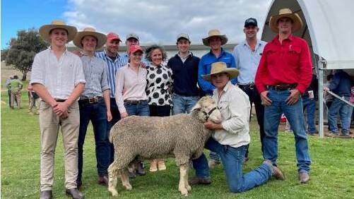 The $24,000 top-priced ram with vendor, Chad Taylor (third left), and buyer, Simon Coutts (second right) of Willera stud, Serpentine, Victoria.