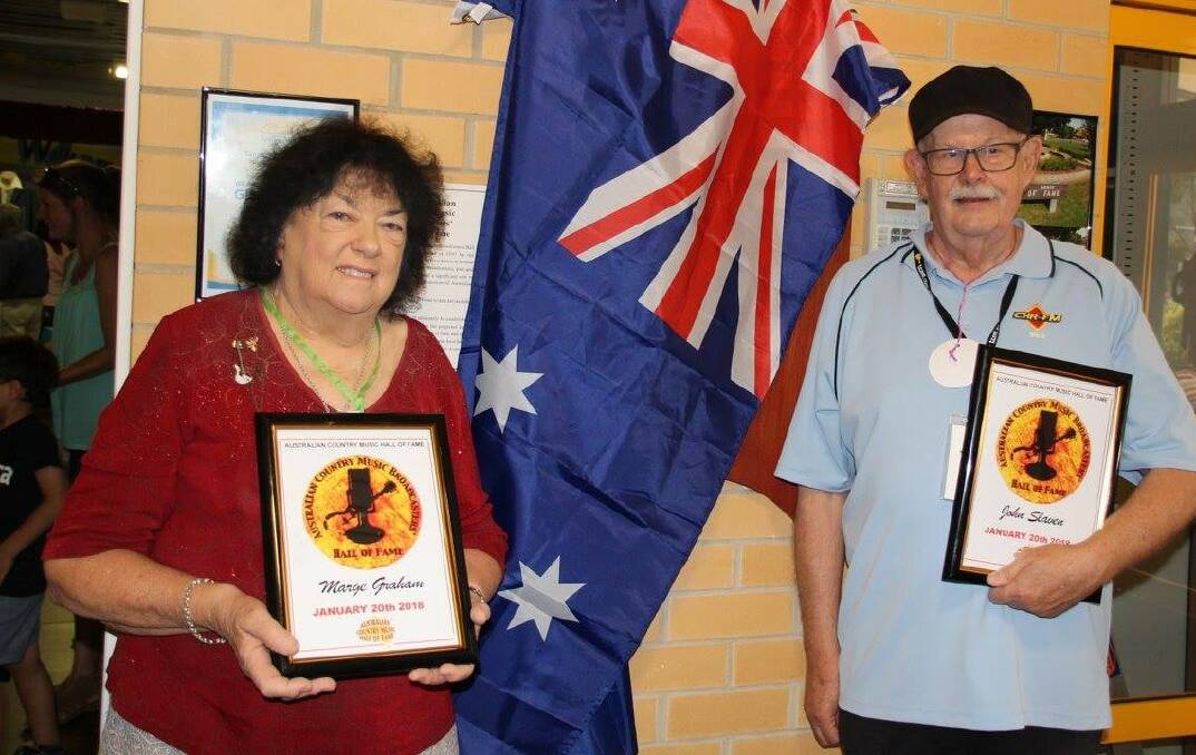 Marge Graham pictured with John Slaven after being acknowledged as Broadcaster of the Year in 2018. Photo: Robyn McIntosh