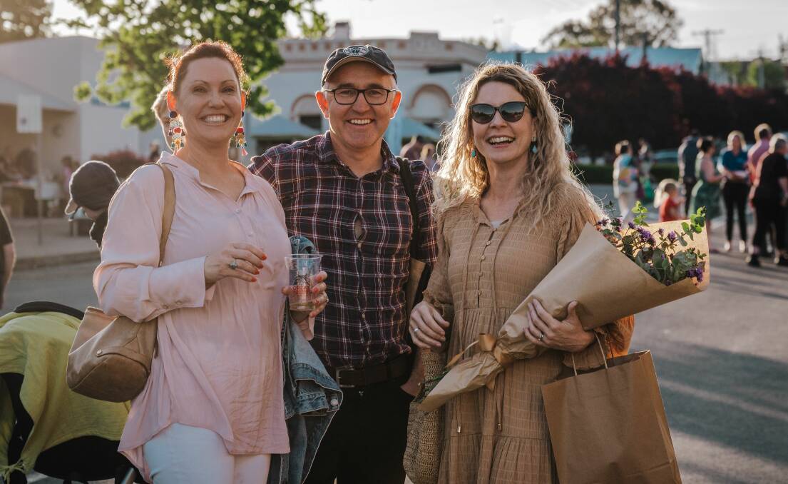 A throwback image from the inaugural Molong Christmas Shopping Night in 2022 of Amorette and Rob Zielinski with Olivia West. Picture by Emily Wilde.