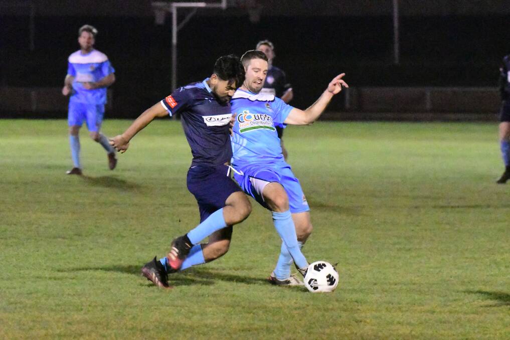 ON FIRE: Orange Waratahs' WPL centre mid, Craig Sugden on fire following 8-1 victory against Dubbo's Macquarie United on July 7. Photo: JUDE KEOGH.