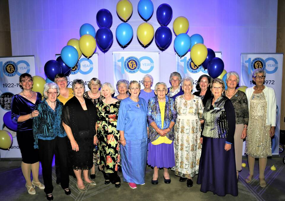 Robin Godwin, (second from right) with the CWA Macquarie Group at the 100th gala ball at Randwick Racecourse in May 2022. Picture: Supplied