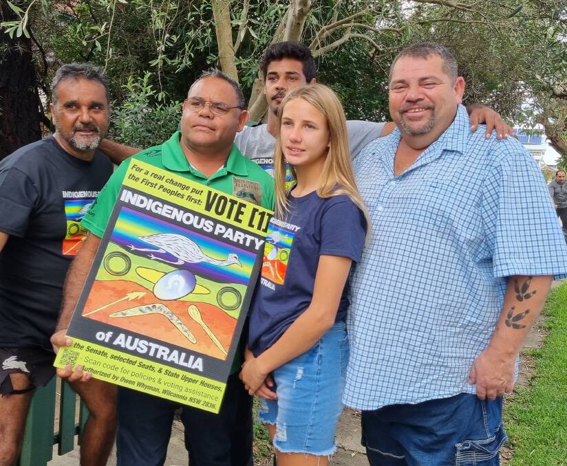 FIRST IAP CORFLUTE: Derek Hardman (R) with senate candidates Owen Whyman and Lawrence Brooke with Mr Whyman's children, Kathalka and Jamin (back). PICTURE: SUPPLIED