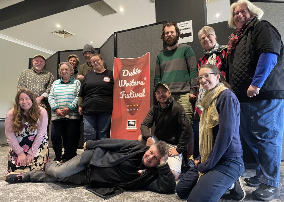 Members of the Orana Writers' Hub at the Dubbo Writers' Festival on Saturday, 10 September 2022 workshop at The Greens with writer and art teacher Val Clark (seated on the floor), Lee Robinson (seated behind Val) and Daniel Budden (standing behind Lee). Picture by Elizabeth Frias