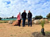 Parkes MP Mark Coulton (right) with Macquarie Home Stay director Rod Crowfoot and board director Susie Hill at the garden to be surrounded by the Queen's commemorative trees. Picture: Elizabeth Frias