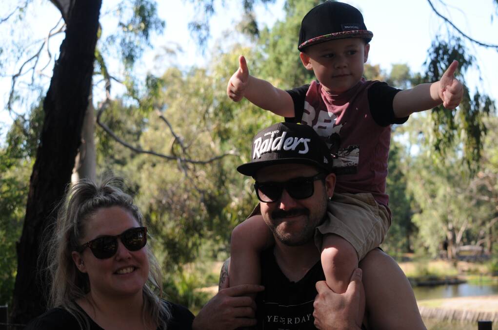 Ryan Wilson is the happiest three-year-old at Taronga Western Plains Zoo yesterday showing his double thumbs up for the best animals he has seen.