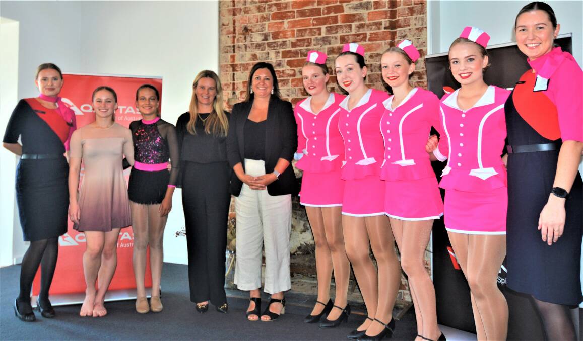 Qantas chief operating officer Petrea Bradford (4th from left) with regional development, local government and territories minister Kristy McBain, Dubbo City Eisteddfod Society dancers and Qantas crew at the Qantas Regional Grants Program launch at The Exchange in Dubbo NSW on Tuesday, February 21, 2023. Picture by Elizabeth Frias