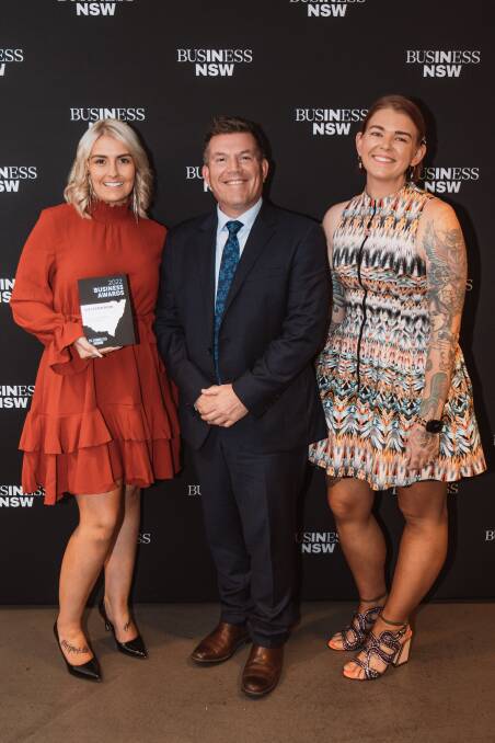 Dubbo MP Dugald Saunders congratulates chamber president Errin Williamson and executive officer Brittany Sultana at the Western NSW Business Awards at Taronga Western Plains Zoo. Picture: Supplied