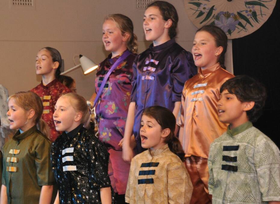Among the local kids in Dubbo performing in a musical show at previous Youth Music Theatre Program. Picture supplied