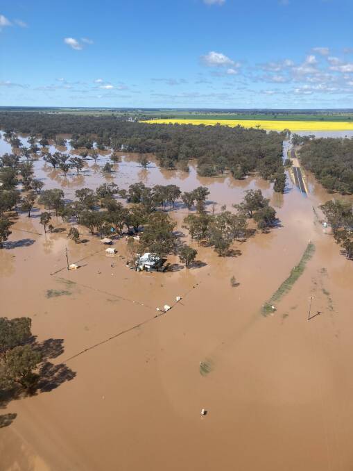Picture taken by NSW State Emergency Services from its helicopter on Sunday, 25 September 2022 of Dandaloo Bridge underwater as well as houses near the bridge. Picture Supplied