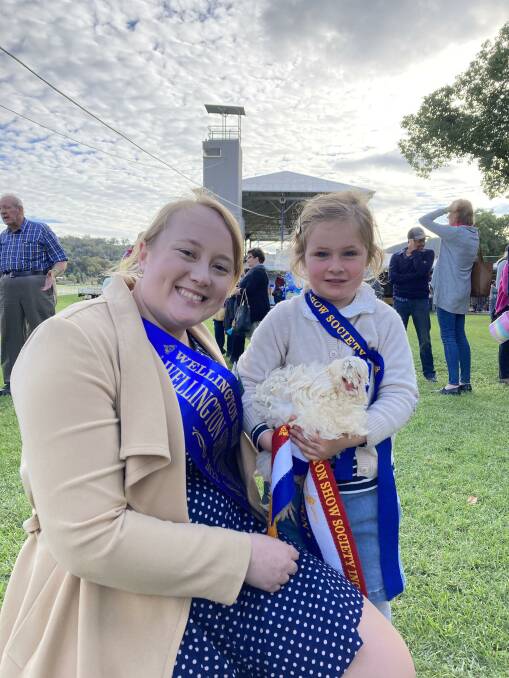 Kate Jeffery, pictured with a children's category winner, will relinquish the sash to the 2023 Young Woman of the Year on Saturday, May 13 when the show opens. Picture supplied