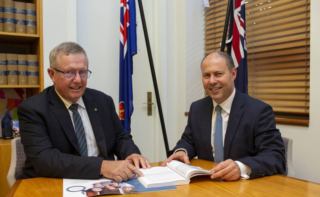 REDUCING COST OF LIVING:. Parkes MP Mark Coulton with federal treasurer Josh Frydenberg at Canberra for the budget announcement. Picture: CONTRIBUTED