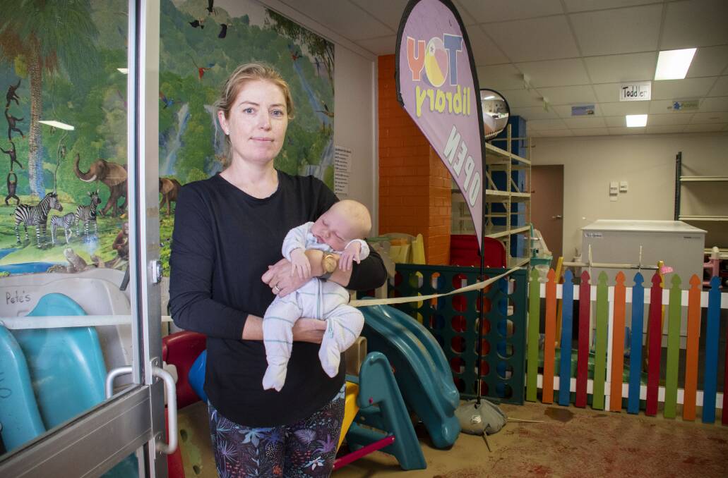 Orana Toy Library coordinator Emily Bell and her baby, Toby. Picture by Belinda Soole
